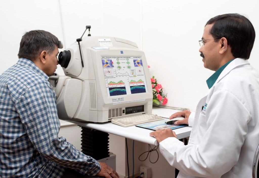 Dr Shailesh G M doing Glaucoma test on patient